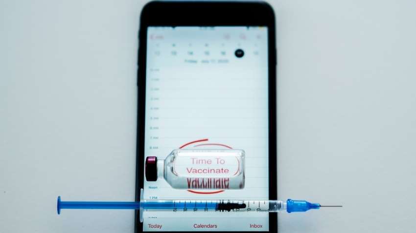 cell_phone_with_vaccine_bottel.